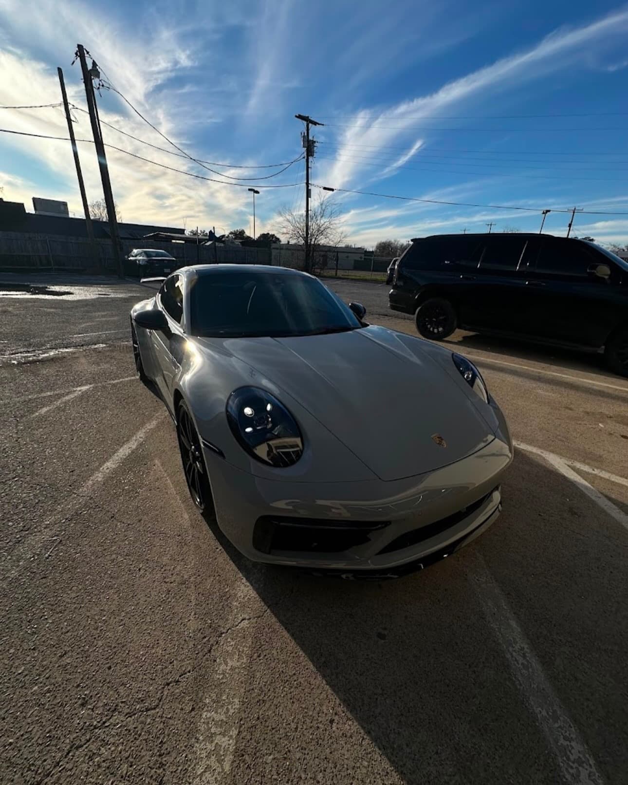 Silver Porsche 911 outside the Richardson shop